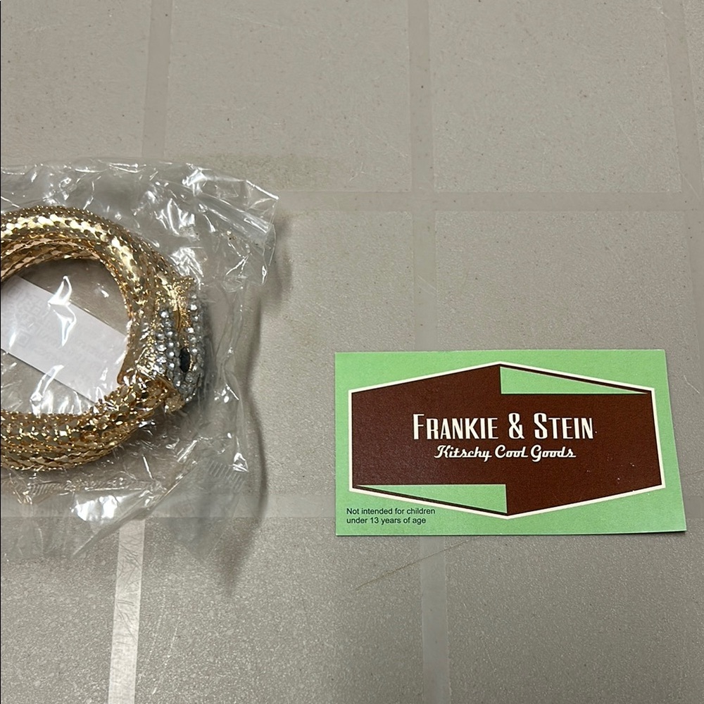 Gold tone and Silvery Serpent Bracelet with Sparkling Embellishments - Picture 12 of 12